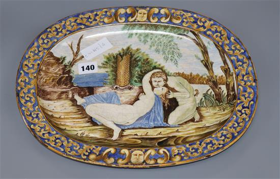 An oval maiolica dish, 19th century length 38cm